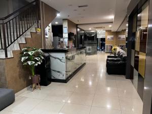 a lobby of a hospital with a waiting room at Signature Hotel in Kuantan