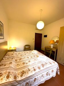 Postel nebo postele na pokoji v ubytování Appartamenti Portiglioni-Belvedere