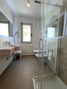 Łazienka w obiekcie Hotel Regina