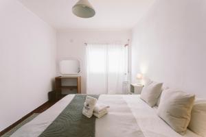 Postel nebo postele na pokoji v ubytování Best Houses 75 - Aurora Apartment