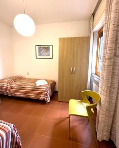 Postel nebo postele na pokoji v ubytování Appartamenti Portiglioni-Belvedere