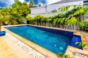 卡馬拉海灘的住宿－Recommend a warm Thai style private swimming pool villa with convenient traffic and living, walking 700 meters to the the beach，相簿中的一張相片