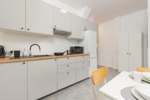 O bucătărie sau chicinetă la Apartment Kotwiczników +6 fotografii
