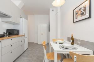 O bucătărie sau chicinetă la Apartment Kotwiczników