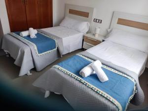 Postel nebo postele na pokoji v ubytování Moraira Beach 1