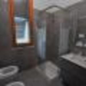 a bathroom with a sink and a toilet at Residence Paradiso Monolocale 206 in Moneglia