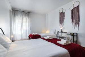 Ένα ή περισσότερα κρεβάτια σε δωμάτιο στο Apartamento Triana