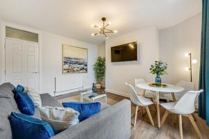 a living room with a couch and a table at Host & Stay - Bedford Place in Liverpool
