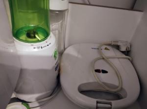 a blender and a toilet in a small room at Studio Sunset in Voždivac