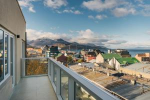 a balcony with a view of a city at Gente del Sur - Urbano Centro in Ushuaia