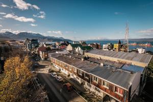 an aerial view of a city with a train station at Gente del Sur - Urbano Centro in Ushuaia +27 photos