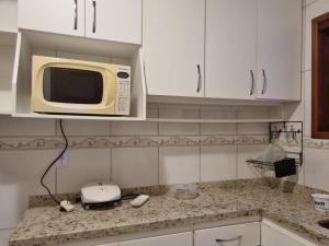 A cozinha ou cozinha compacta de Pousada Caminho das Candeias
