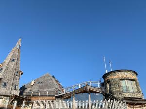 a building with a chimney on top of it at Schneekarhütte in Mayrhofen