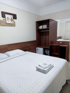 Voodi või voodid majutusasutuse Hotel Excelsior toas