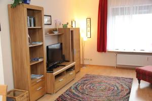 TV a/nebo společenská místnost v ubytování Ferienwohnung Gall + 7 fotografií