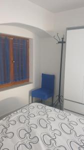 Postel nebo postele na pokoji v ubytování Apartman Lusi