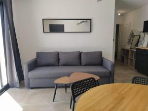 Posezení v ubytování Beau logement neuf à 5 mn de la mer
