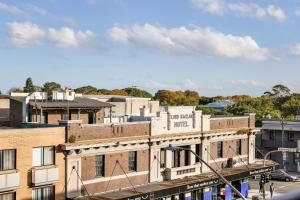an aerial view of a city with buildings at Kahlo Alexandria - Stylish 2 bdrm Walk to Train in Sydney