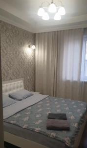 Postel nebo postele na pokoji v ubytování Роща 7
