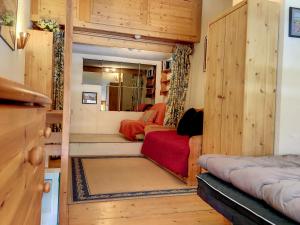 a tiny house with two beds and a closet at Studio Les Arcs 1800, 2 pièces, 5 personnes - FR-1-346-426 in Arc 1800