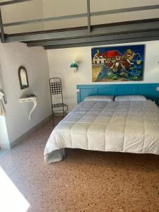 Posteľ alebo postele v izbe v ubytovaní maison de sirenes