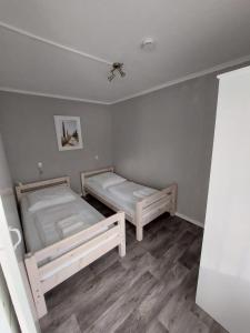 Ferienbungalows am Wolziger See客房内的一张或多张床位