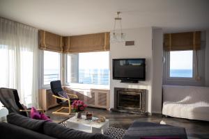 Fotografie z fotogalerie ubytování Salty Breeze Beachfront Apartment-Premium Stay v destinaci Perea + 16 fotografií