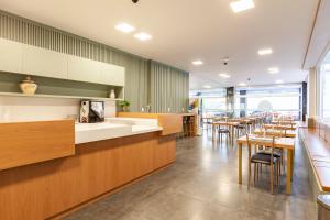 Tri Hotel Executive Osório的休息区