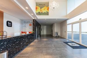 Tri Hotel Executive Osório大厅或接待区