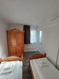 Ferienbungalows am Wolziger See客房内的一张或多张床位