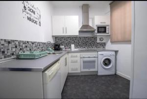 Kuchyň nebo kuchyňský kout v ubytování Vivienda con Fines Turísticos Salvador