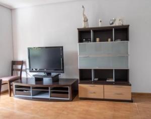 TV a/nebo společenská místnost v ubytování Vivienda con Fines Turísticos Salvador