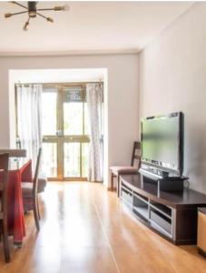TV a/nebo společenská místnost v ubytování Vivienda con Fines Turísticos Salvador
