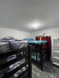 Кровать или кровати в номере Apartamento vacacional galeón 2 Doradal