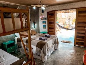 a bedroom with two bunk beds and a large window at Flats Macapá Meu Amor 4 in Luis Correia +33 photos