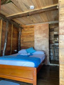 En eller flere senge i et værelse på Chill and Surf Mendihuaca