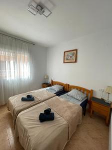 Łóżko lub łóżka w pokoju w obiekcie Apartment Goya