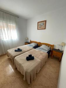 Łóżko lub łóżka w pokoju w obiekcie Apartment Goya