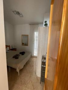 Łóżko lub łóżka w pokoju w obiekcie Apartment Goya