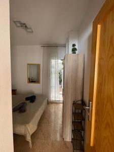 Łóżko lub łóżka w pokoju w obiekcie Apartment Goya