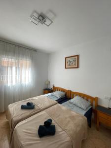 Łóżko lub łóżka w pokoju w obiekcie Apartment Goya