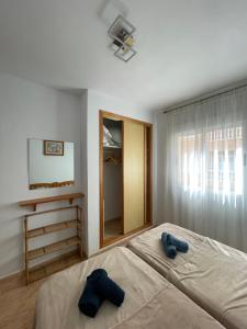 Łóżko lub łóżka w pokoju w obiekcie Apartment Goya