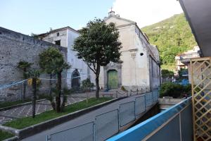 a view of a church from the balcony of a building at mary's apartment in Maiori