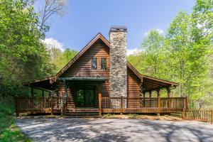 a log cabin with a porch and a chimney at New Listing! Lakeview Lodge - 5 Bed, 4 Bath - Hot Tub in Dahlonega