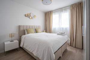 Posteľ alebo postele v izbe v ubytovaní Beautiful Rooftop Pool 3Bed + 31 fotografií
