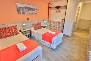 Postel nebo postele na pokoji v ubytování Hotel Bariloche By Tierra Gaucha