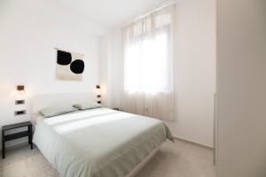 Postel nebo postele na pokoji v ubytování 4 ELEMENTS - Luxury Family Apartments