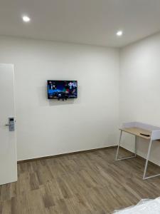 TV a/nebo společenská místnost v ubytování Stella di Mare- Cruise Shuttle