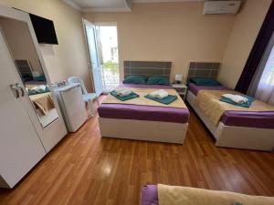 Imeri Hotel客房内的一张或多张床位