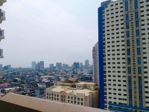 a view of a city with tall buildings at Laureano Trevi Residences Makati Suites Condotel in Manila